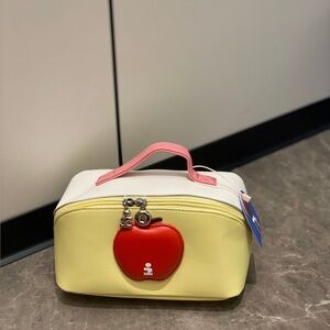 Chic Yellow and White Cosmetic Bag with Red Apple Accent